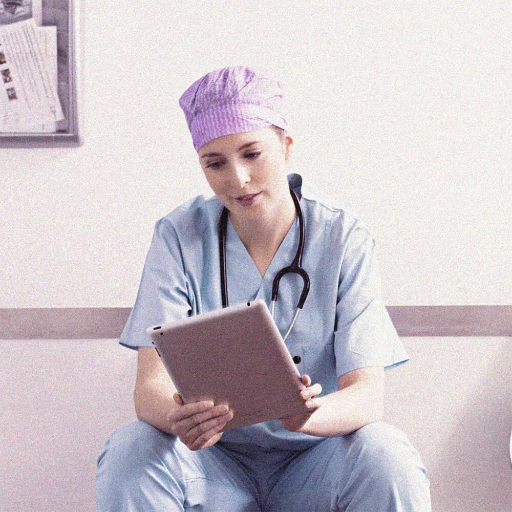 Nurse looking at a document