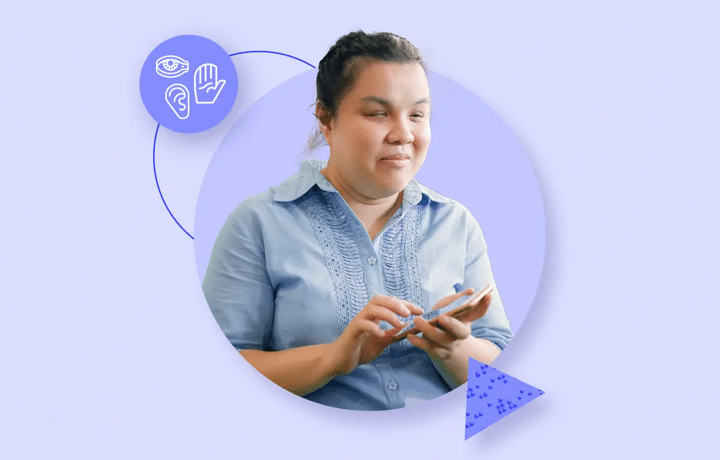 Girl with disabilities using hand-held mobile technology