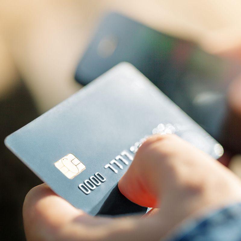 VISA card in hand