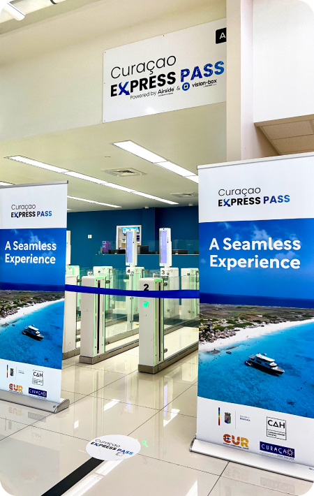 Curacao Express Pass signs at airport line