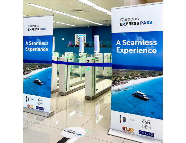 Airside Mobile Curacao Express Pass signage in line at airport