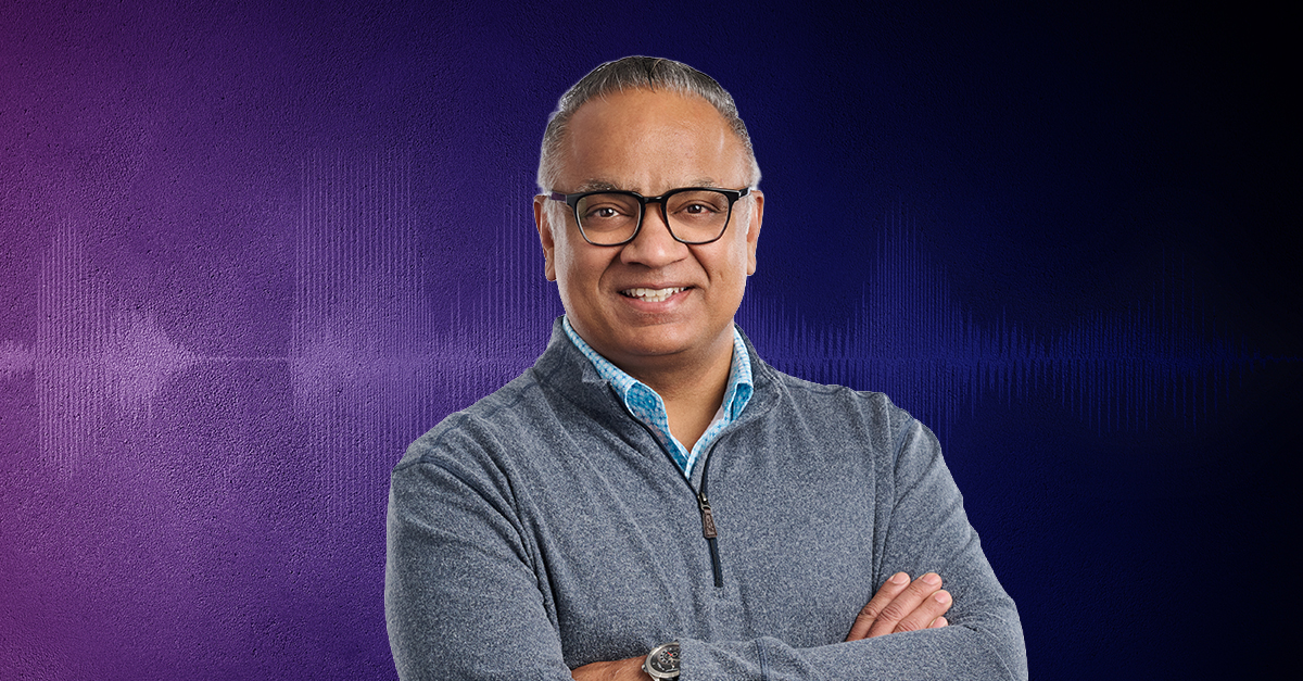 Anudeep Parhar standing with a gradient background