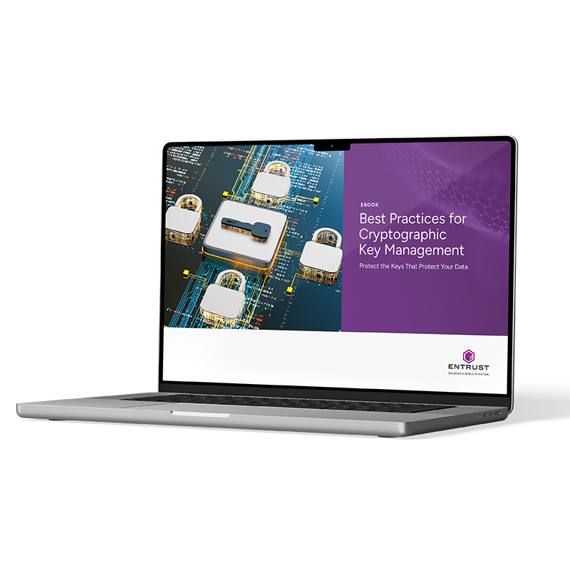 Laptop displaying ebook cover with digital key and circuit lock graphics, titled “Best Practices for Cryptographic Key Management