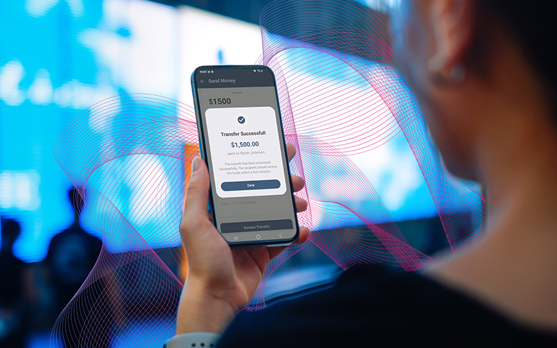 woman looking at successful transaction on phone