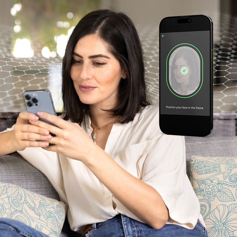 Person completing facial verification on a smartphone