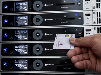 Person presenting a smart card to authenticate access to an Entrust nShield HSM system