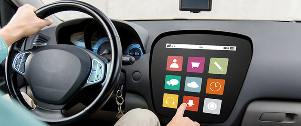 IoT technology being used in a car with a touch screen