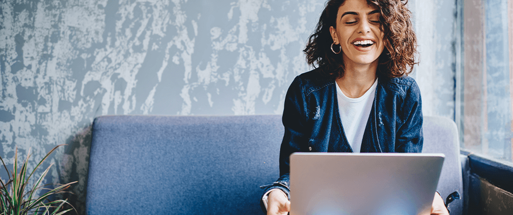 Woman looking at laptop